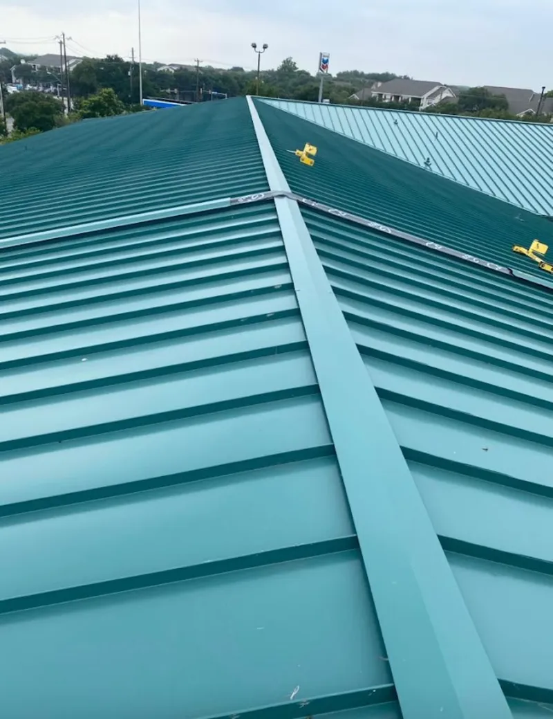 Green commercial metal roof ridge and valley for Metal Roof Repair in Leisure World
